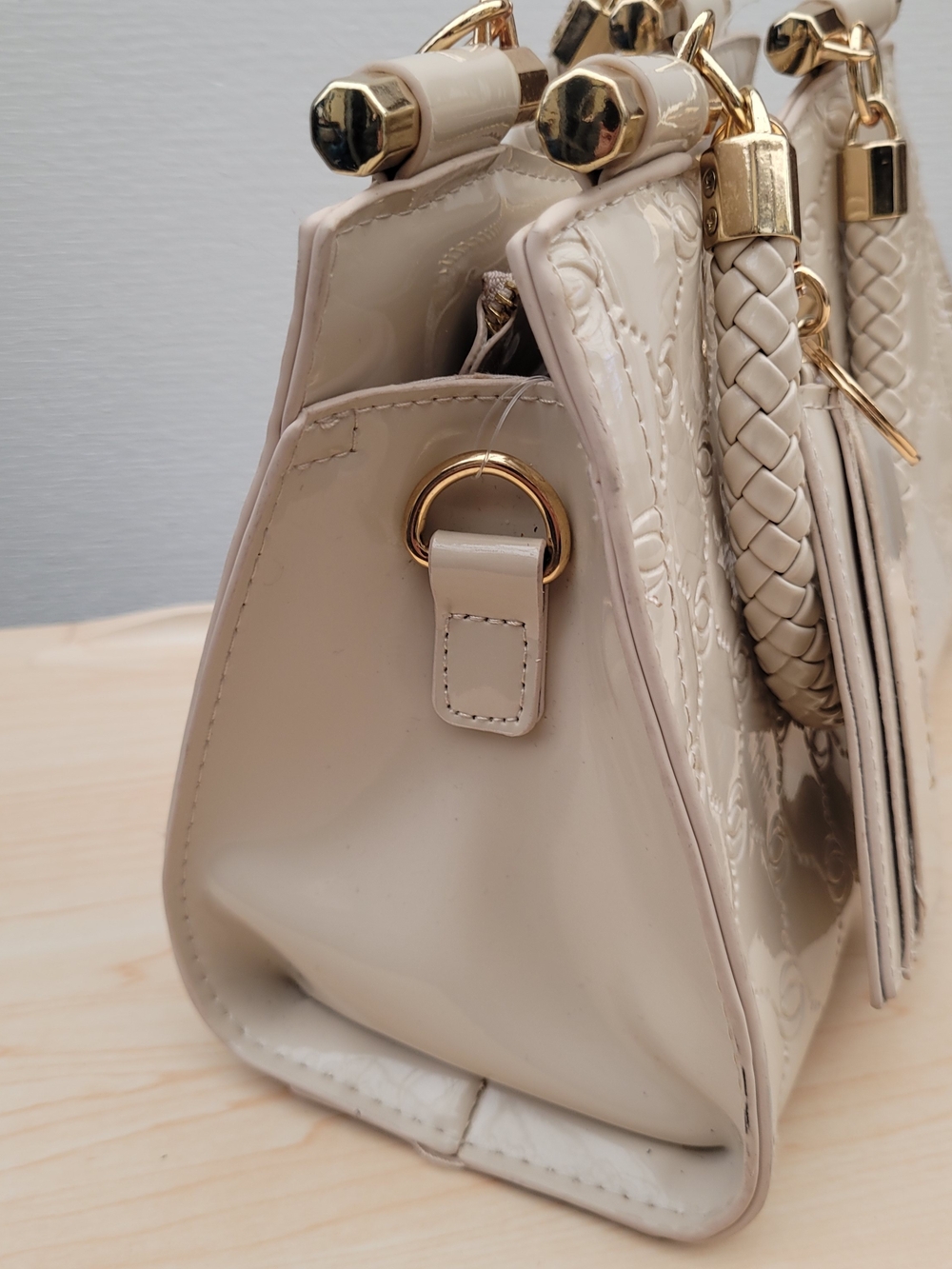 Bebe Cream Embossed Satchel Crossbody Bag – Gold Hardware
Elegant Bebe handbag - Picture 9 of 13